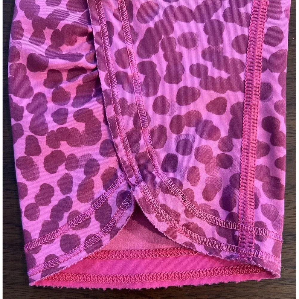 Women's Lululemon Sz 4 Speed Crop Legging animal print Magenta Purple Pocket